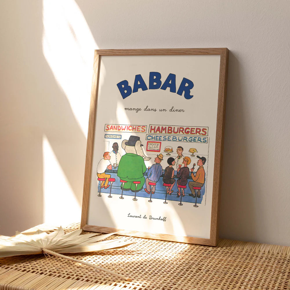 Affiche Babar mange dans un diner