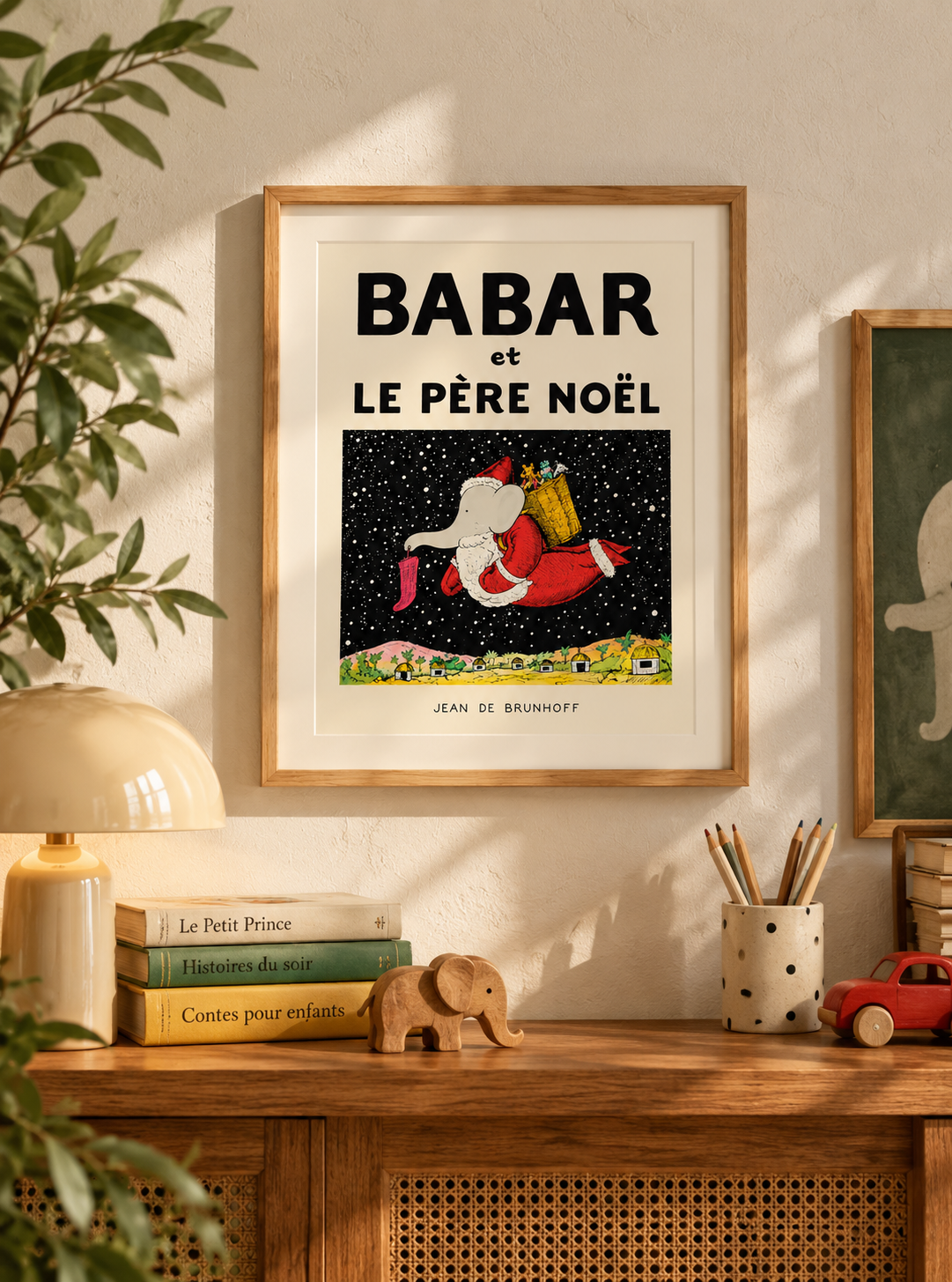 Affiche Babar et le Père Noël en décoration murale dans une chambre enfant